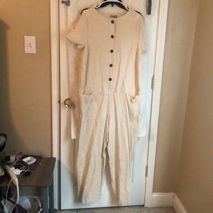 Tan Utility jumpsuit with buttons down the front